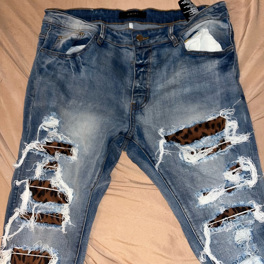 Distressed Blue Jeans with Leopard Accents